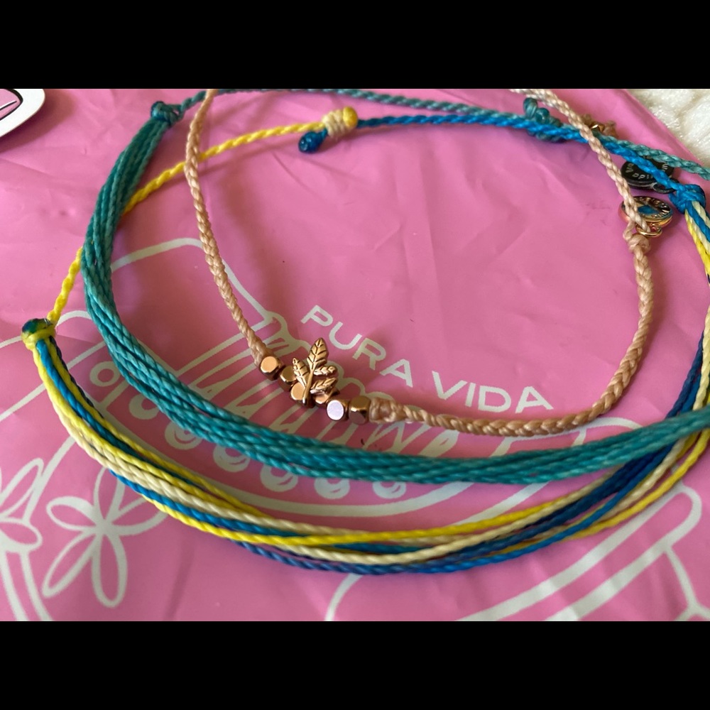3 Pura Vida bracelets + stickers